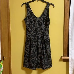 Grey dress with black rosette detail